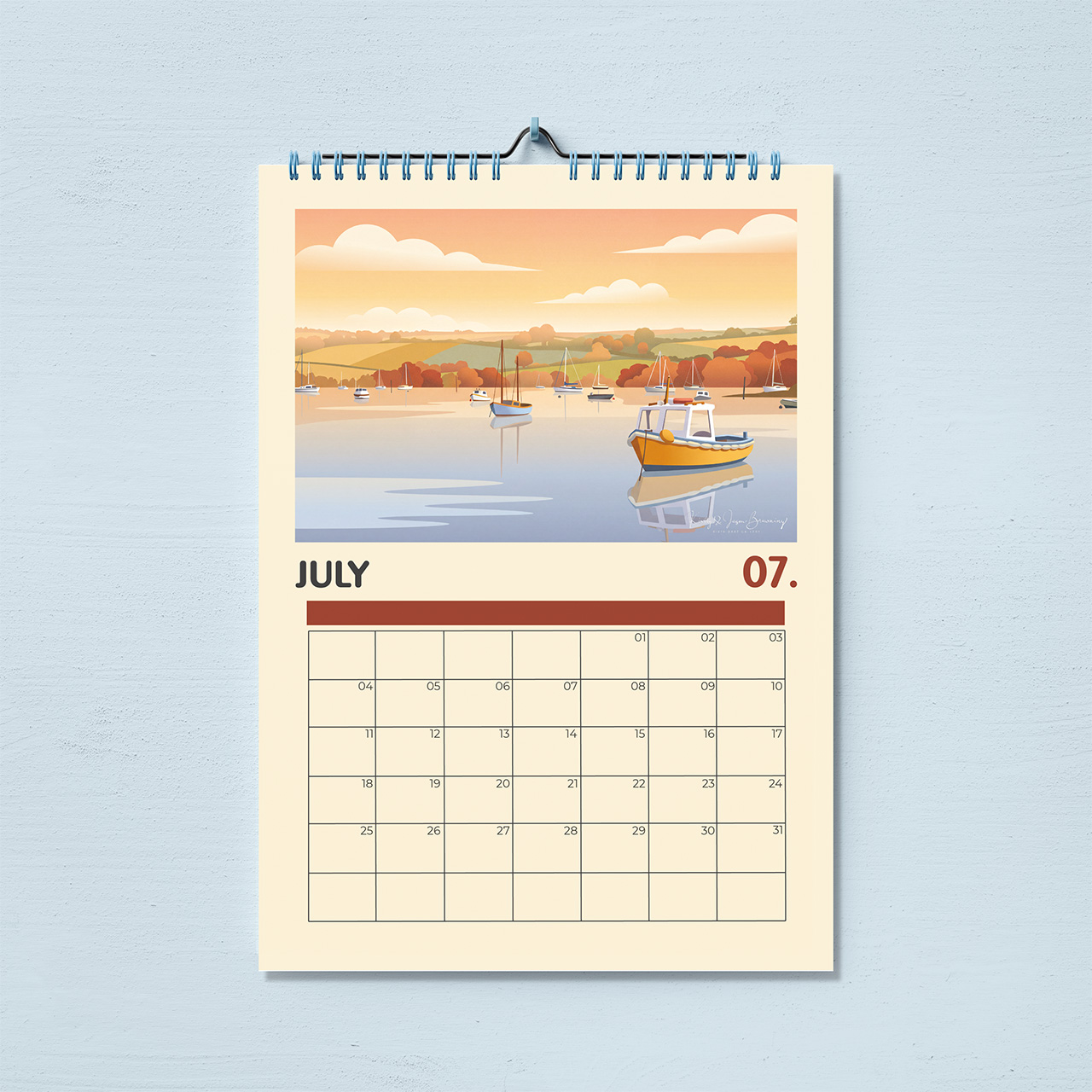 Stoke Gabriel Calendar 2027 July page — illustrated yellow fishing boat and moored yachts on the river below patchwork hills