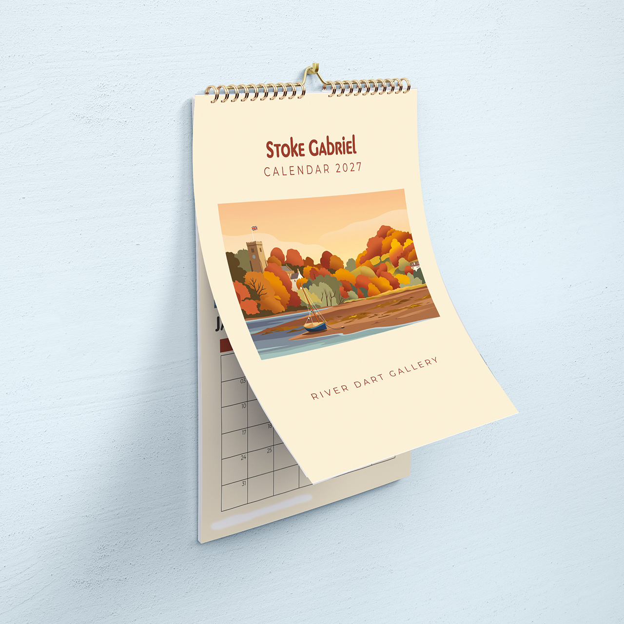 Stoke Gabriel Calendar 2027 with the cover turning to reveal the January page beneath