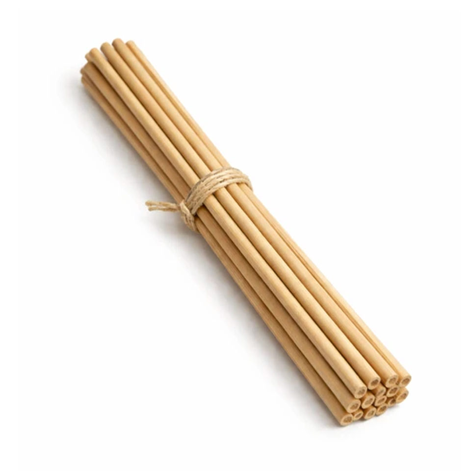 A bundle of ten natural fibre diffuser reeds tied with twine