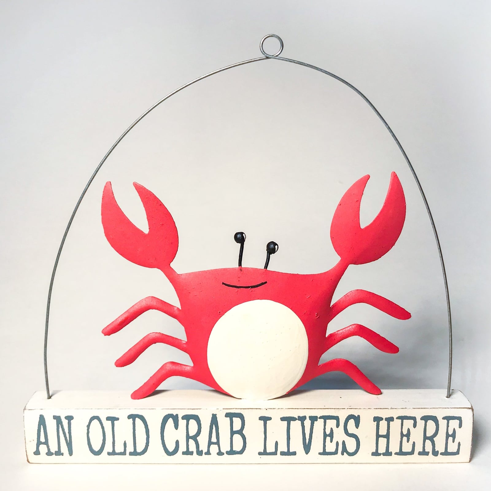 An Old Crab Lives Here